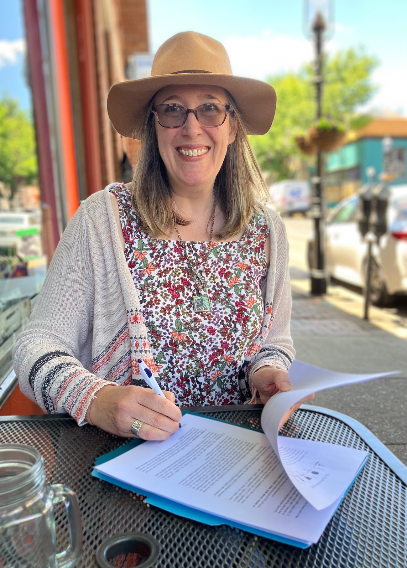 Author Erica Colahan signing book contract